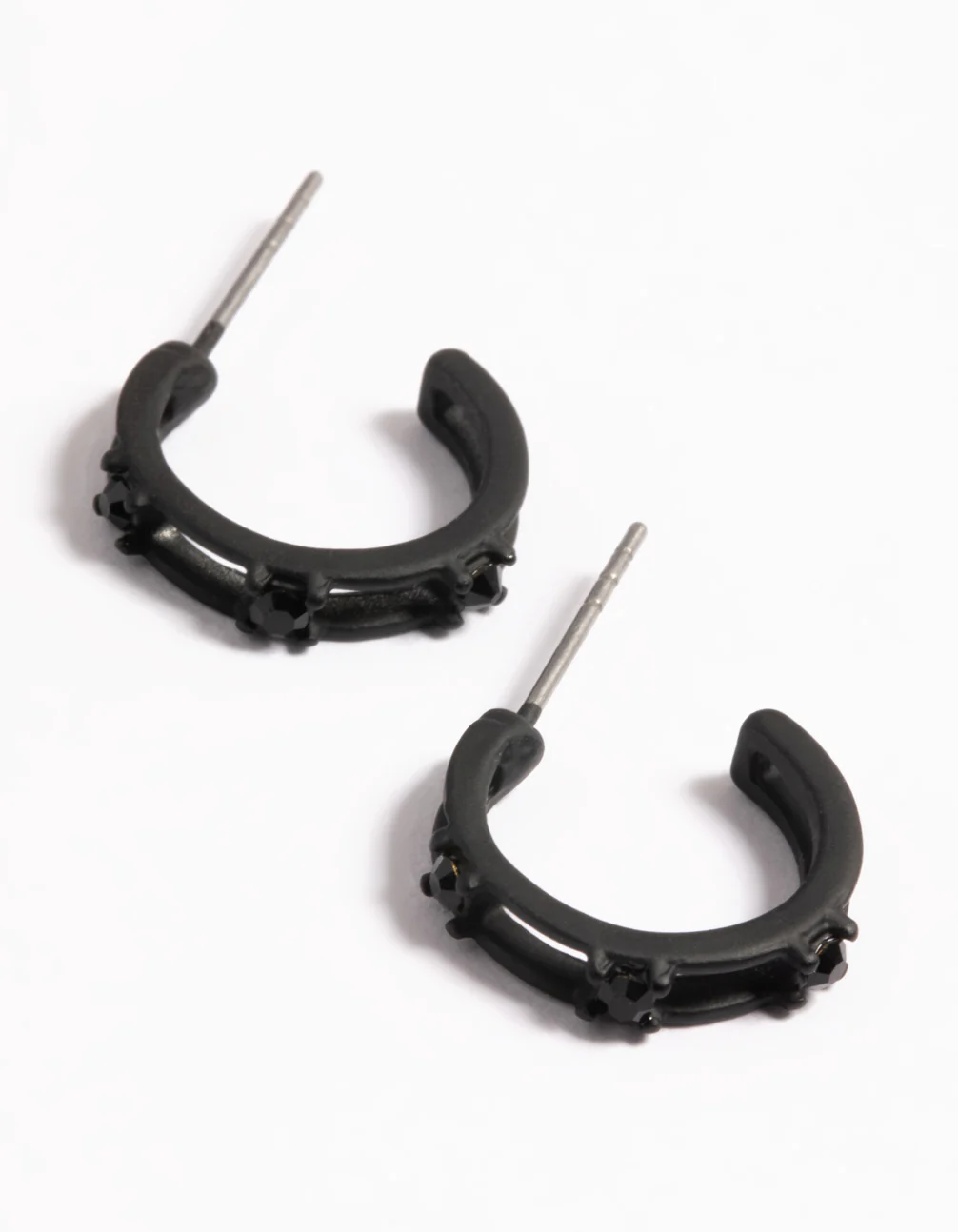 2202-black-coated-triple-crystal-huggie-earrings-1.webp Black Coated Triple Crystal Huggie Earrings