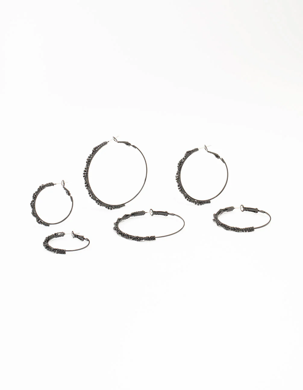 2203-black-coated-twisted-hoop-earrings-3-pack-1.webp Black Coated Twisted Hoop Earrings 3-Pack