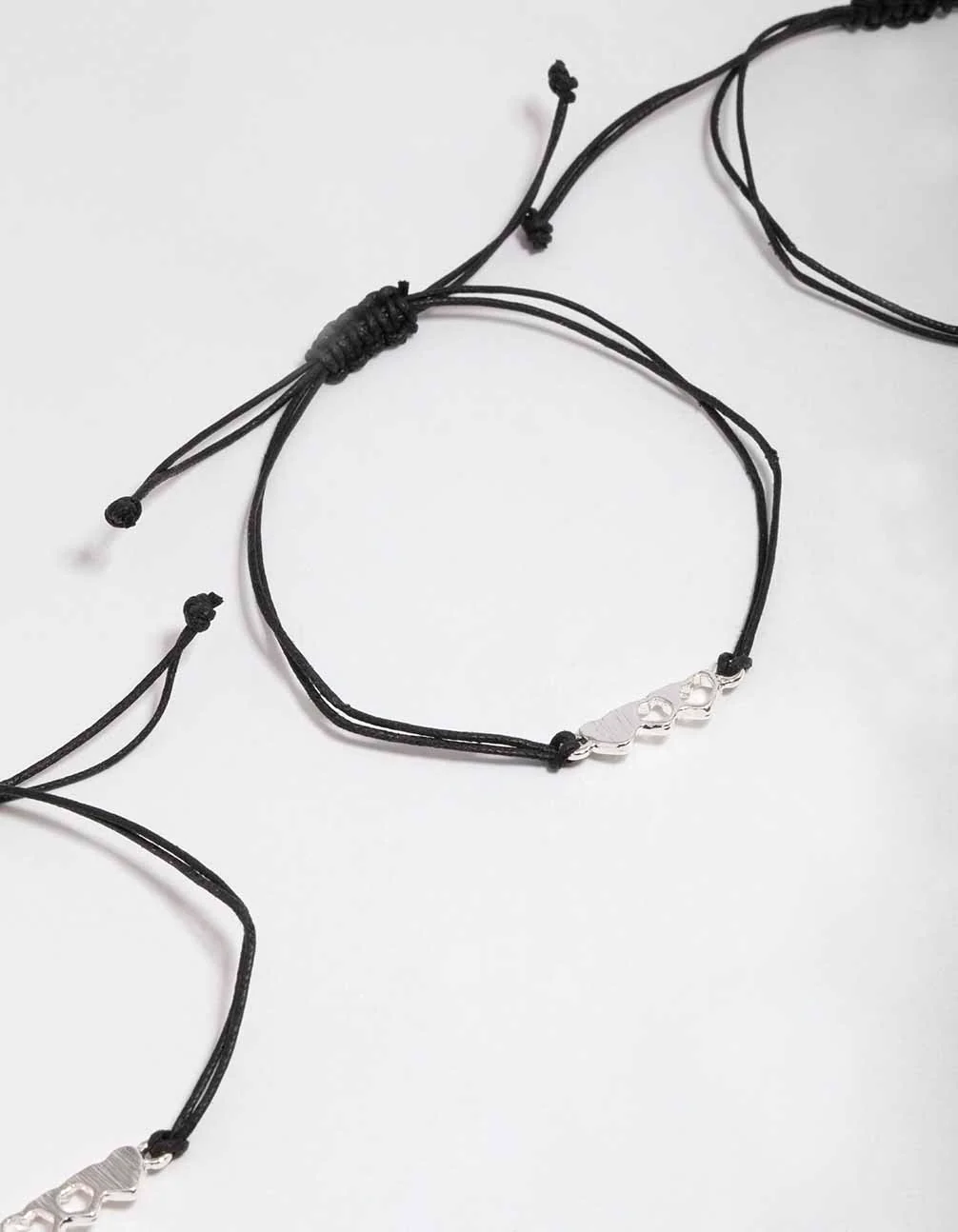 2207-black-cord-heart-bracelet-3-pack-2.webp Black Cord Heart Bracelet 3-Pack