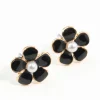 2231-black-daisy-stud-earrings-1.webp Black Daisy Stud Earrings