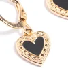 2282-black-enamel-heart-huggie-earrings-4.webp Black Enamel Heart Huggie Earrings