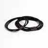 2309-black-fabric-multi-hair-ties-pack-1.webp Black Fabric Multi Hair Ties Pack