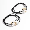 2313-black-fabric-pearl-bead-hair-tie-pack-3.webp Black Fabric Pearl & Bead Hair Tie Pack
