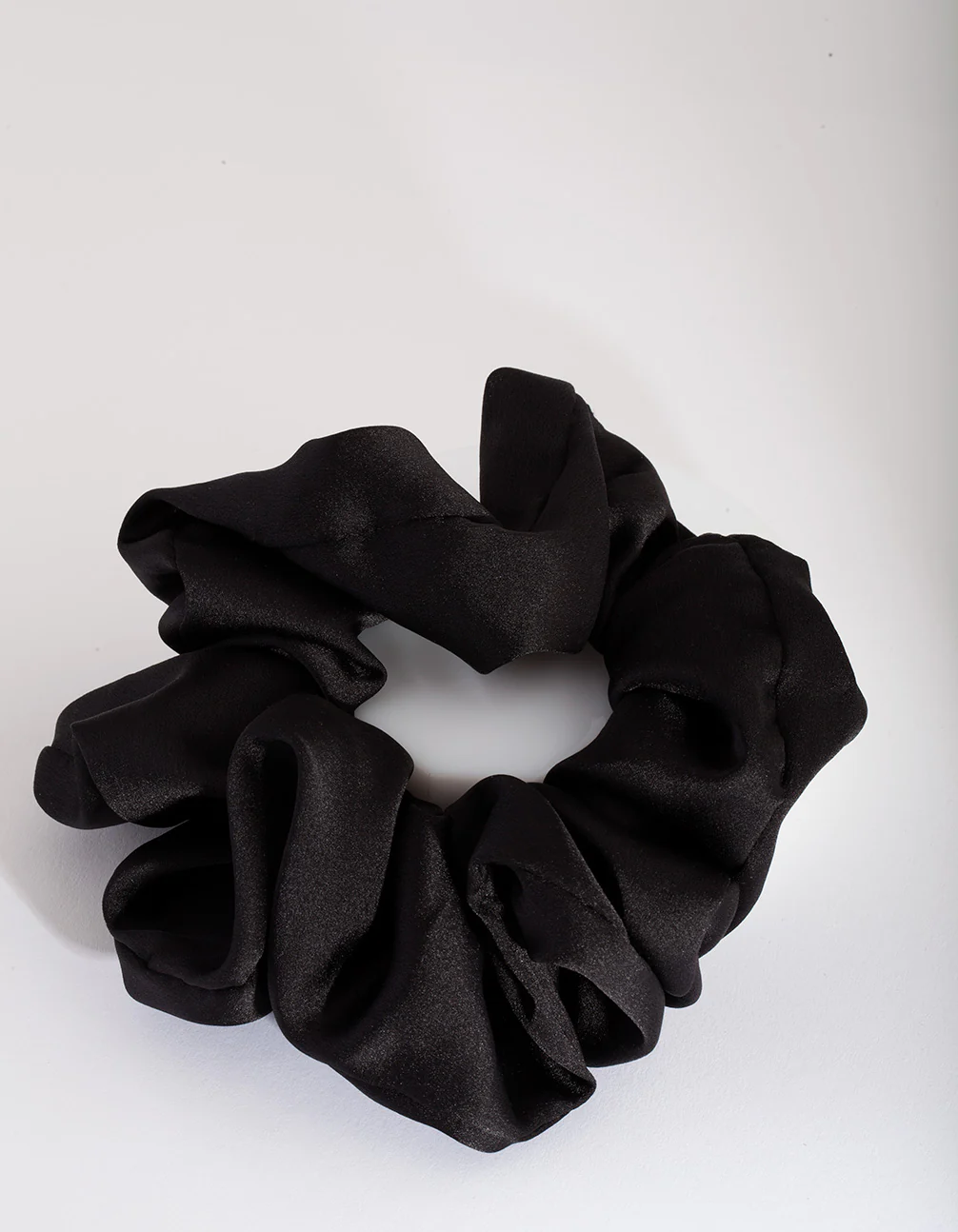 2464-black-satin-oversized-scrunchie-1.webp Black Satin Oversized Scrunchie