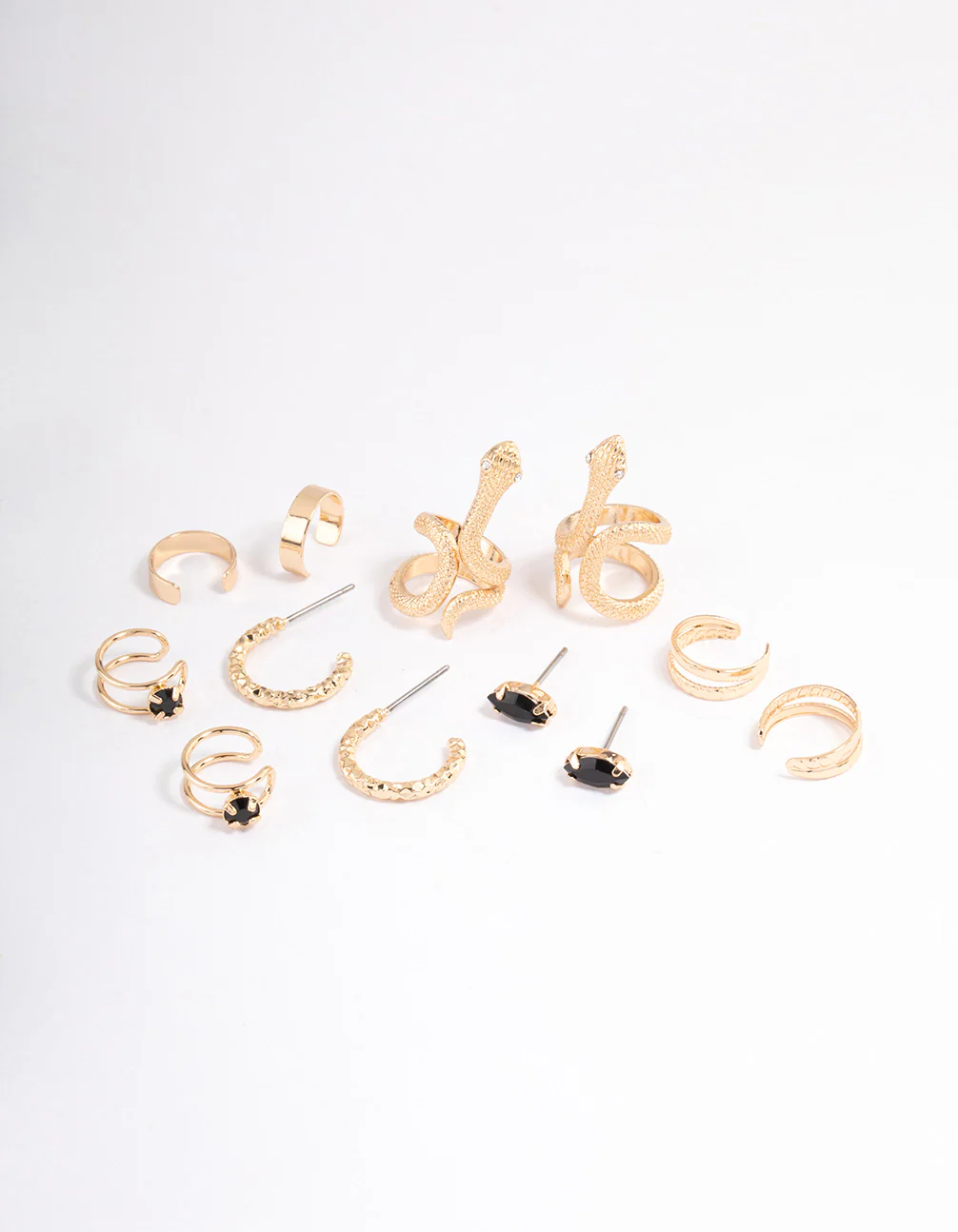 2467-black-serpent-cuff-earrings-6-pack-1.webp Black Serpent Cuff Earrings 6-Pack