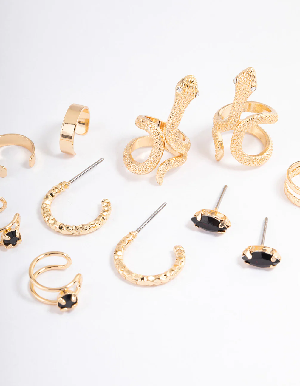 2467-black-serpent-cuff-earrings-6-pack-2.webp Black Serpent Cuff Earrings 6-Pack