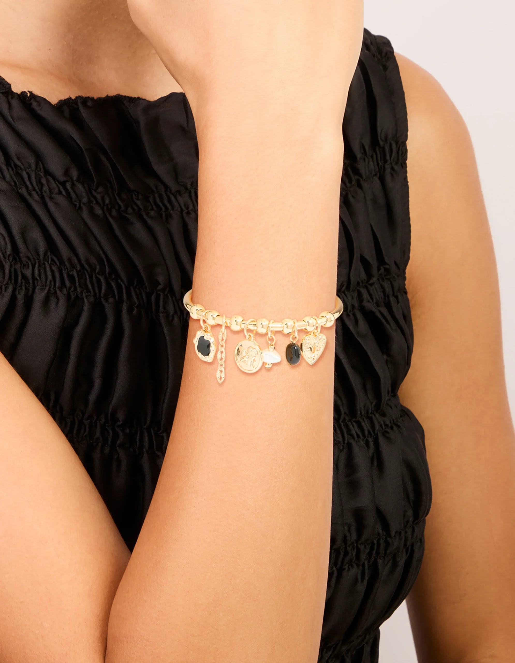 250-gold-heart-black-stone-charm-bracelet-1.webp Gold Heart & Black Stone Charm Bracelet