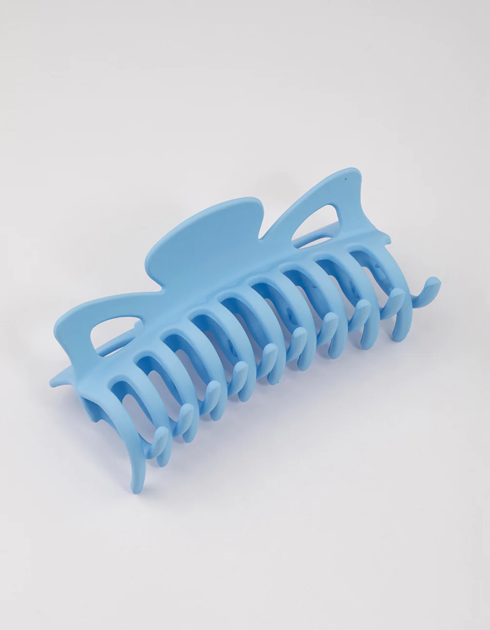 2564-blue-acrylic-triangular-cut-out-claw-clip-1.webp Blue Acrylic Triangular Cut Out Claw Clip