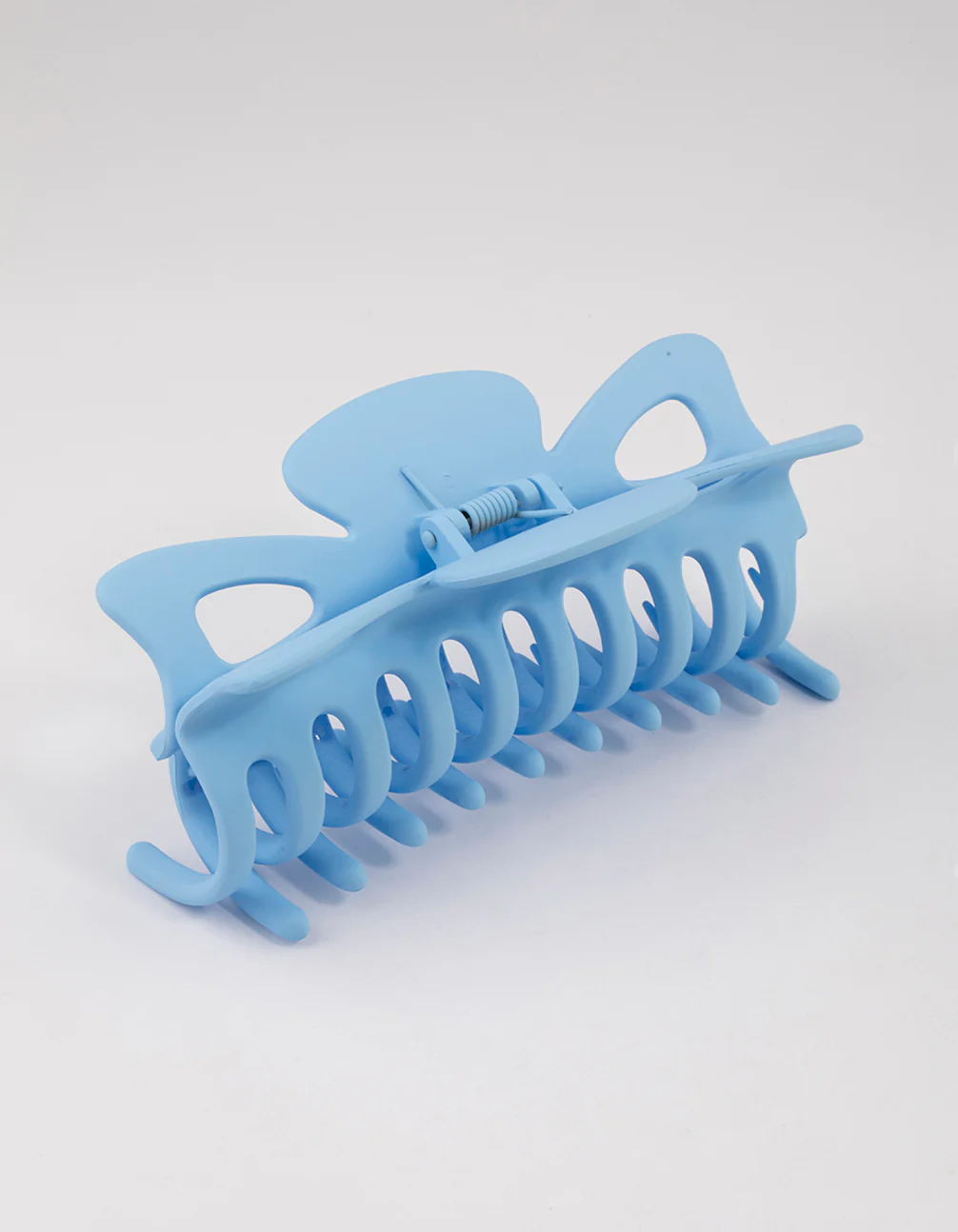 2564-blue-acrylic-triangular-cut-out-claw-clip-2.webp Blue Acrylic Triangular Cut Out Claw Clip
