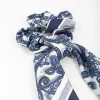 2618-blue-fabric-paisley-satin-scarf-2.webp Blue Fabric Paisley Satin Scarf