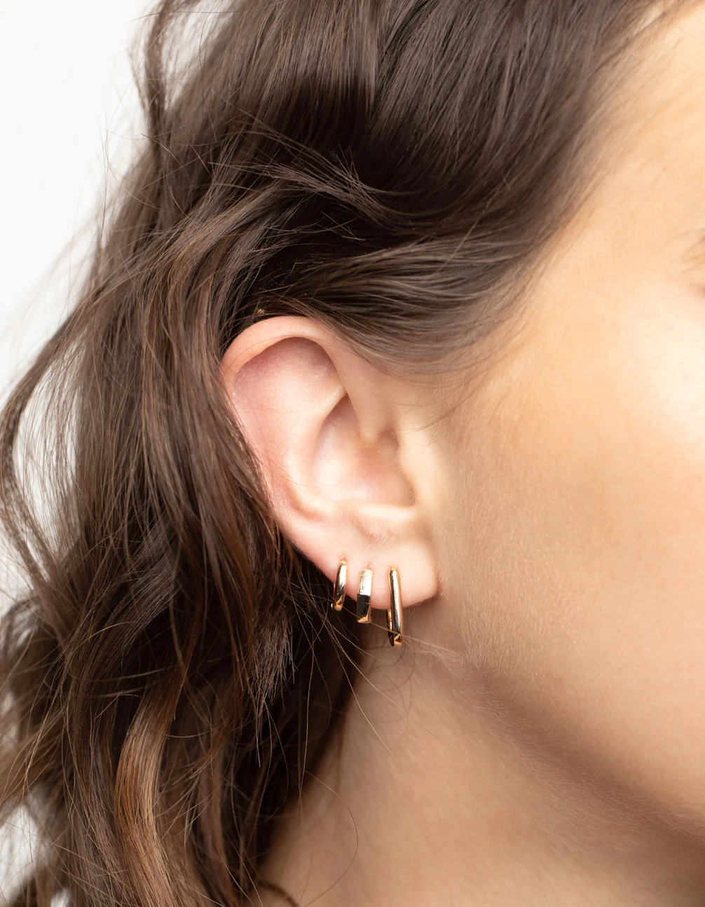 264-gold-mini-shaped-huggie-earrings-pack-2.webp Gold Mini Shaped Huggie Earrings Pack