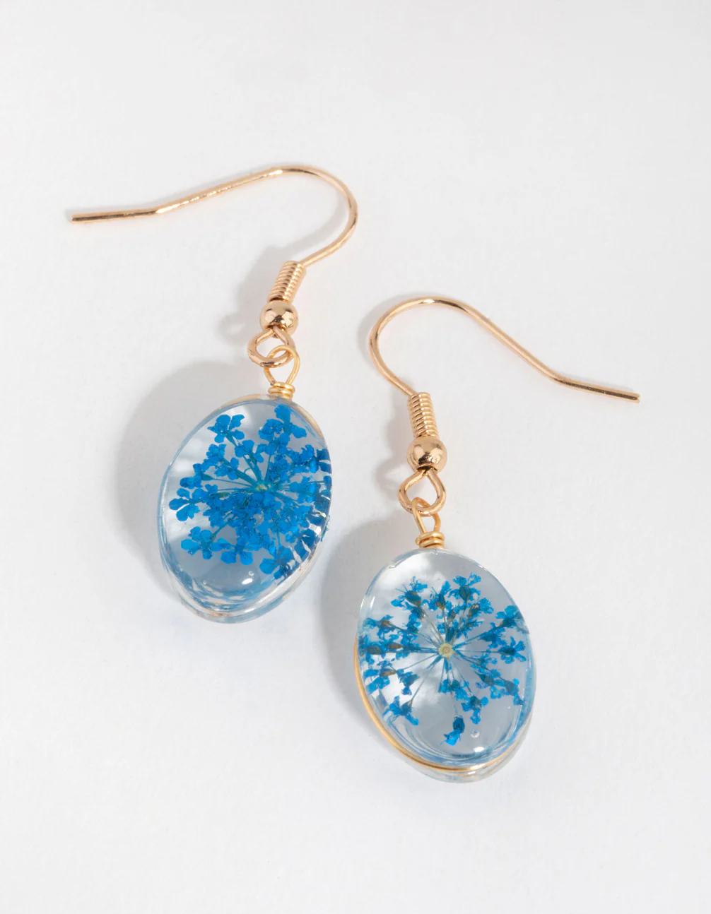 2665-blue-oval-clear-bead-drop-earrings-1.webp Blue Oval Clear Bead Drop Earrings