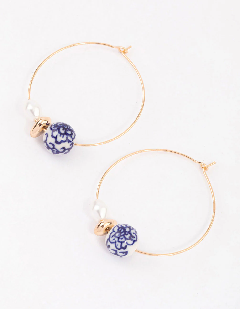 2669-blue-pearl-ceramic-beaded-hoop-earrings-1.webp Blue Pearl & Ceramic Beaded Hoop Earrings
