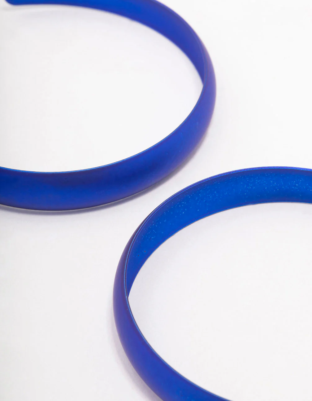 2690-blue-rubber-coated-hoop-earrings-60mm-3.webp Blue Rubber Coated Hoop Earrings 60mm