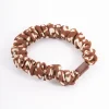 2776-brown-fabric-clamp-thin-scrunchie-1.webp Brown Fabric Clamp Thin Scrunchie