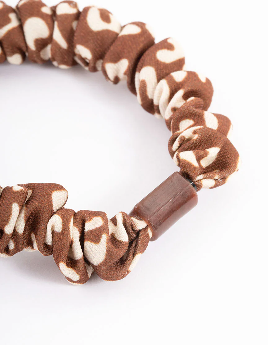 2776-brown-fabric-clamp-thin-scrunchie-2.webp Brown Fabric Clamp Thin Scrunchie