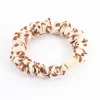 2777-brown-fabric-clamp-thin-scrunchie-1.webp Brown Fabric Clamp Thin Scrunchie