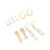 286-gold-pink-enamel-fish-earrings-5-pack-1.webp Gold Pink & Enamel Fish Earrings 5-Pack