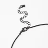 2879-coated-black-boxchain-large-diamante-cross-necklace-3.webp Coated Black Boxchain Large Diamante Cross Necklace