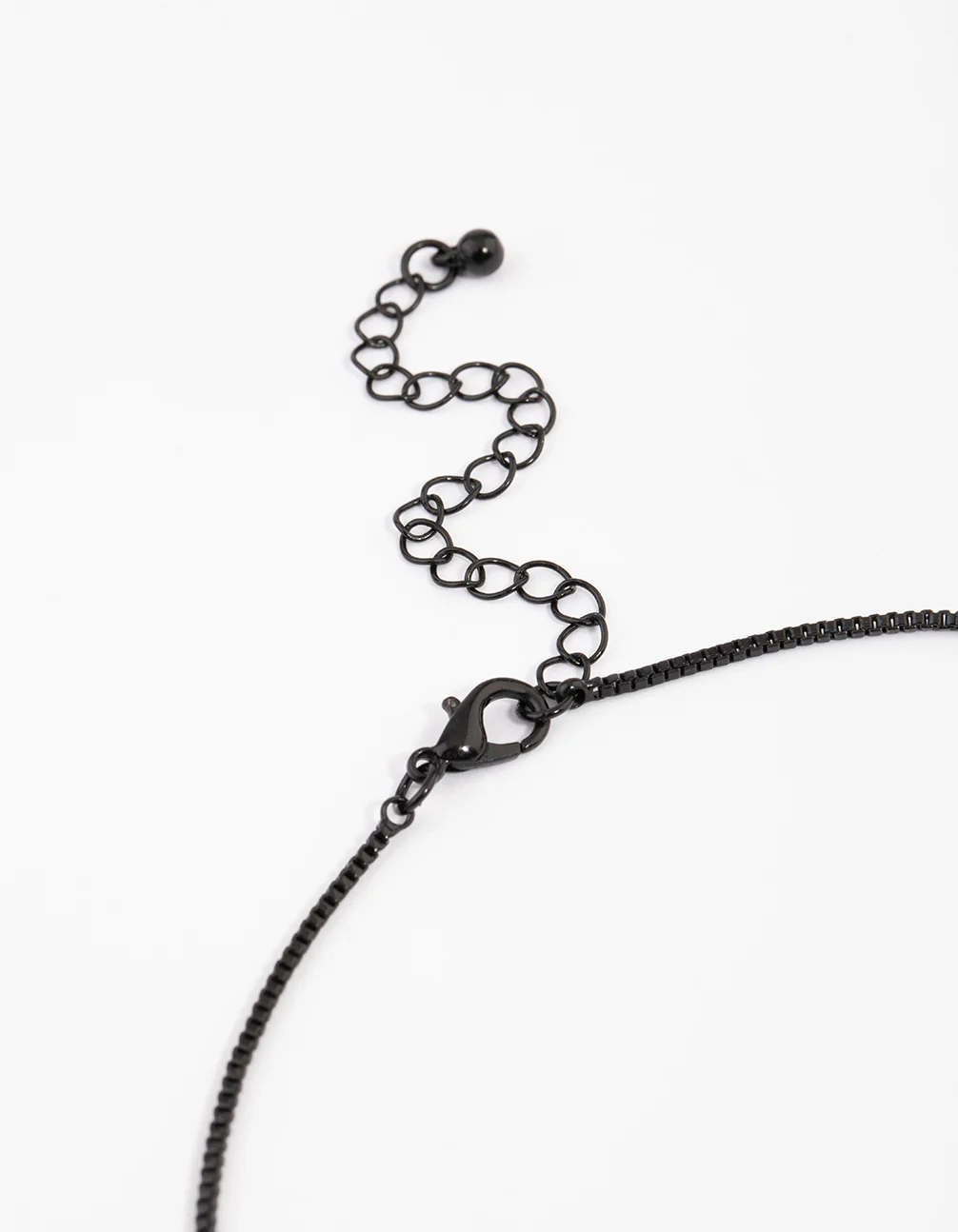 2879-coated-black-boxchain-large-diamante-cross-necklace-3.webp Coated Black Boxchain Large Diamante Cross Necklace