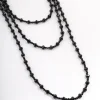2889-coated-black-layered-bead-facet-necklace-1.webp Coated Black Layered Bead & Facet Necklace