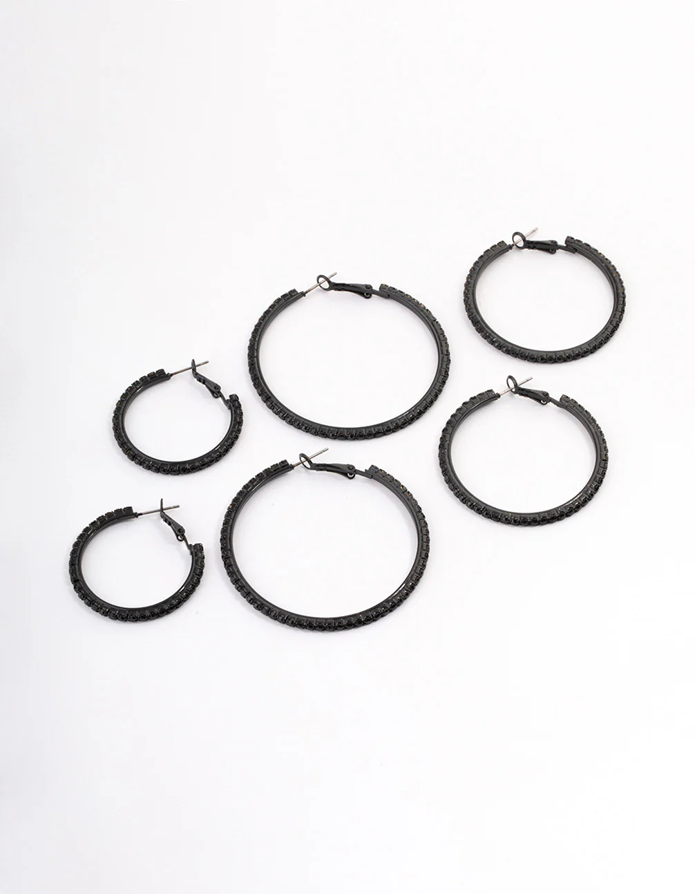2894-coated-black-mixed-size-diamante-hoop-earrings-1.webp Coated Black Mixed Size Diamante Hoop Earrings