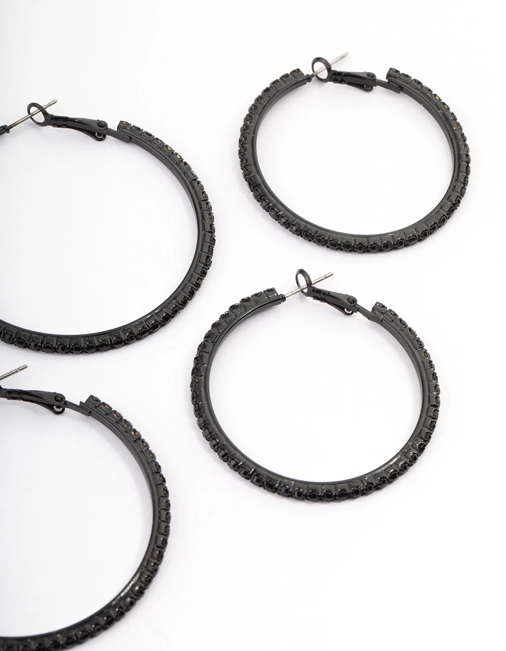2894-coated-black-mixed-size-diamante-hoop-earrings-3.webp Coated Black Mixed Size Diamante Hoop Earrings