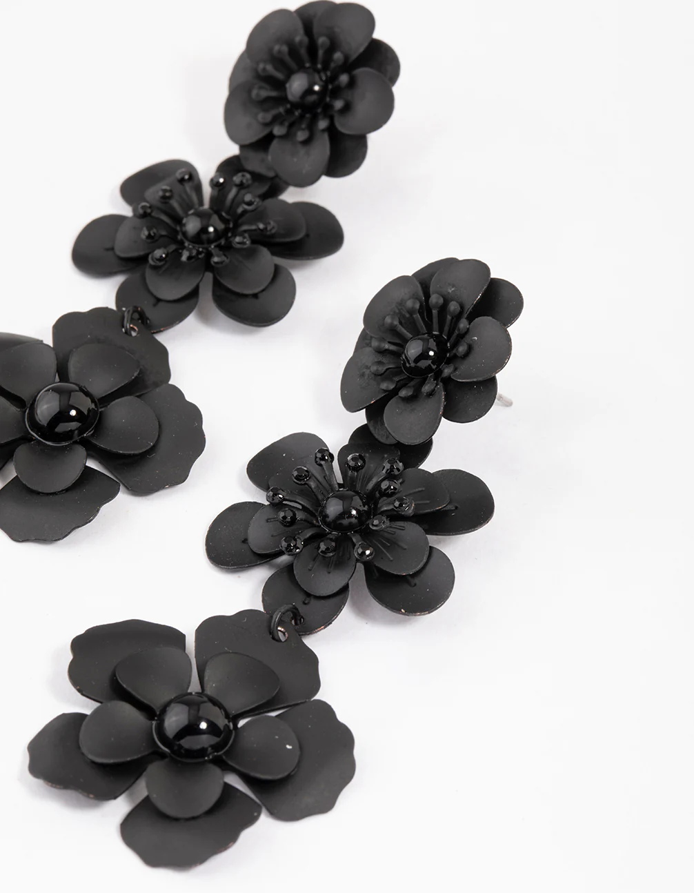 2901-coated-black-triple-diamante-flower-drop-earrings-1.webp Coated Black Triple Diamante Flower Drop Earrings