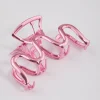 2933-coated-pink-metallic-swirl-hair-claw-clip-1.webp Coated Pink Metallic Swirl Hair Claw Clip