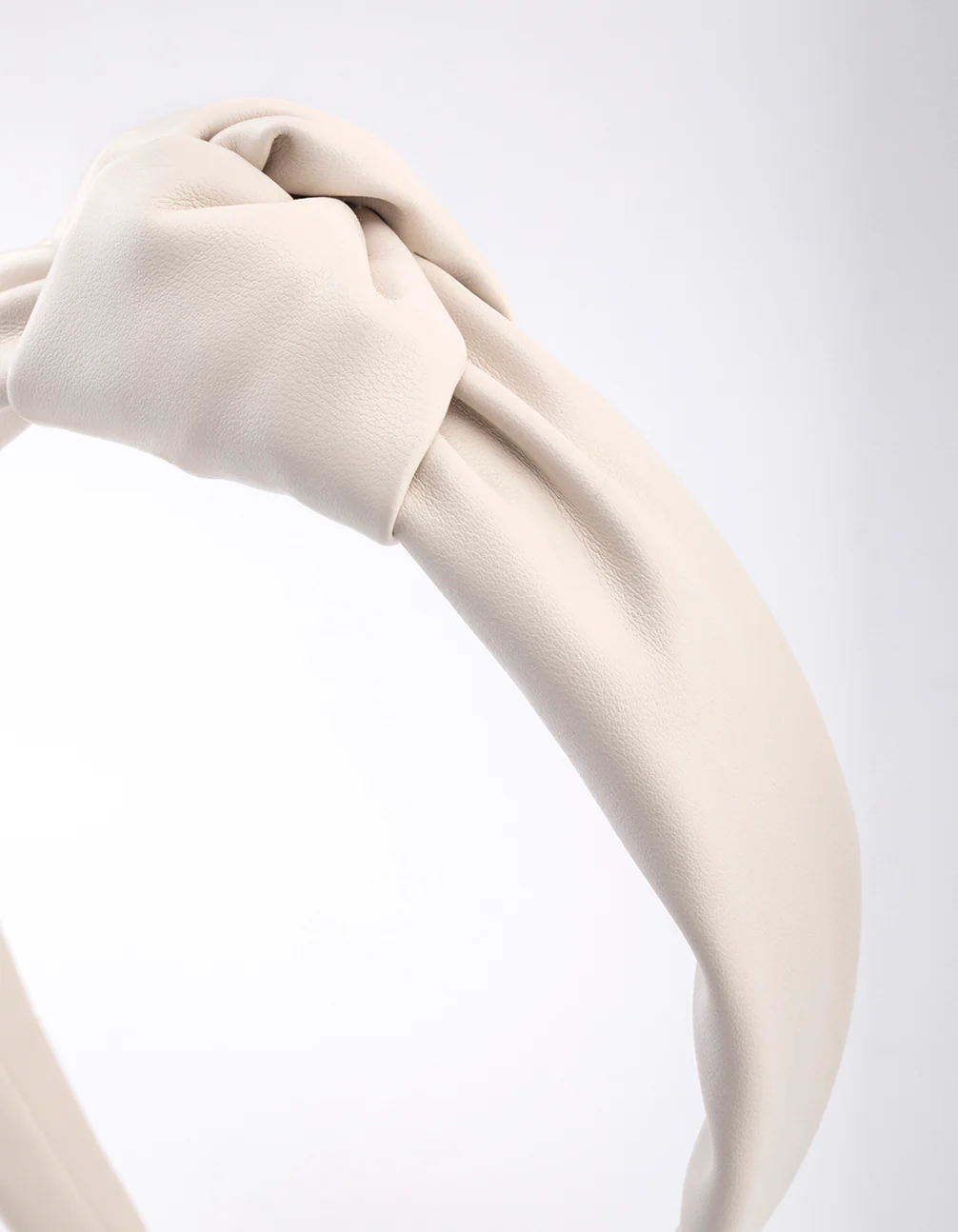 2976-cream-fabric-faux-leather-large-knot-headband-2.webp Cream Fabric Faux Leather Large Knot Headband