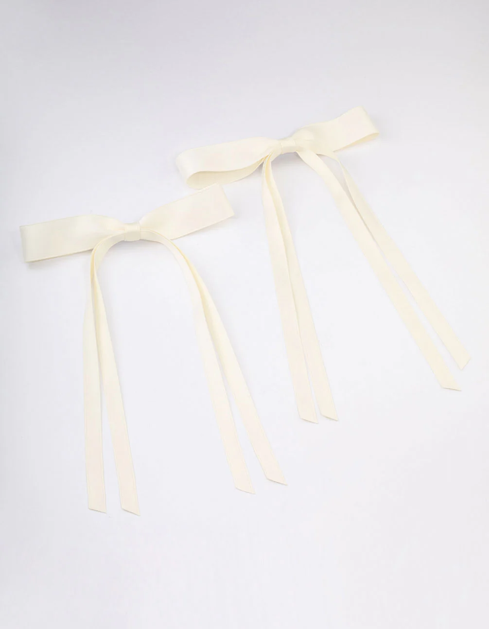 2981-cream-fabric-wide-skinny-hair-bow-pack-1.webp Cream Fabric Wide Skinny Hair Bow Pack
