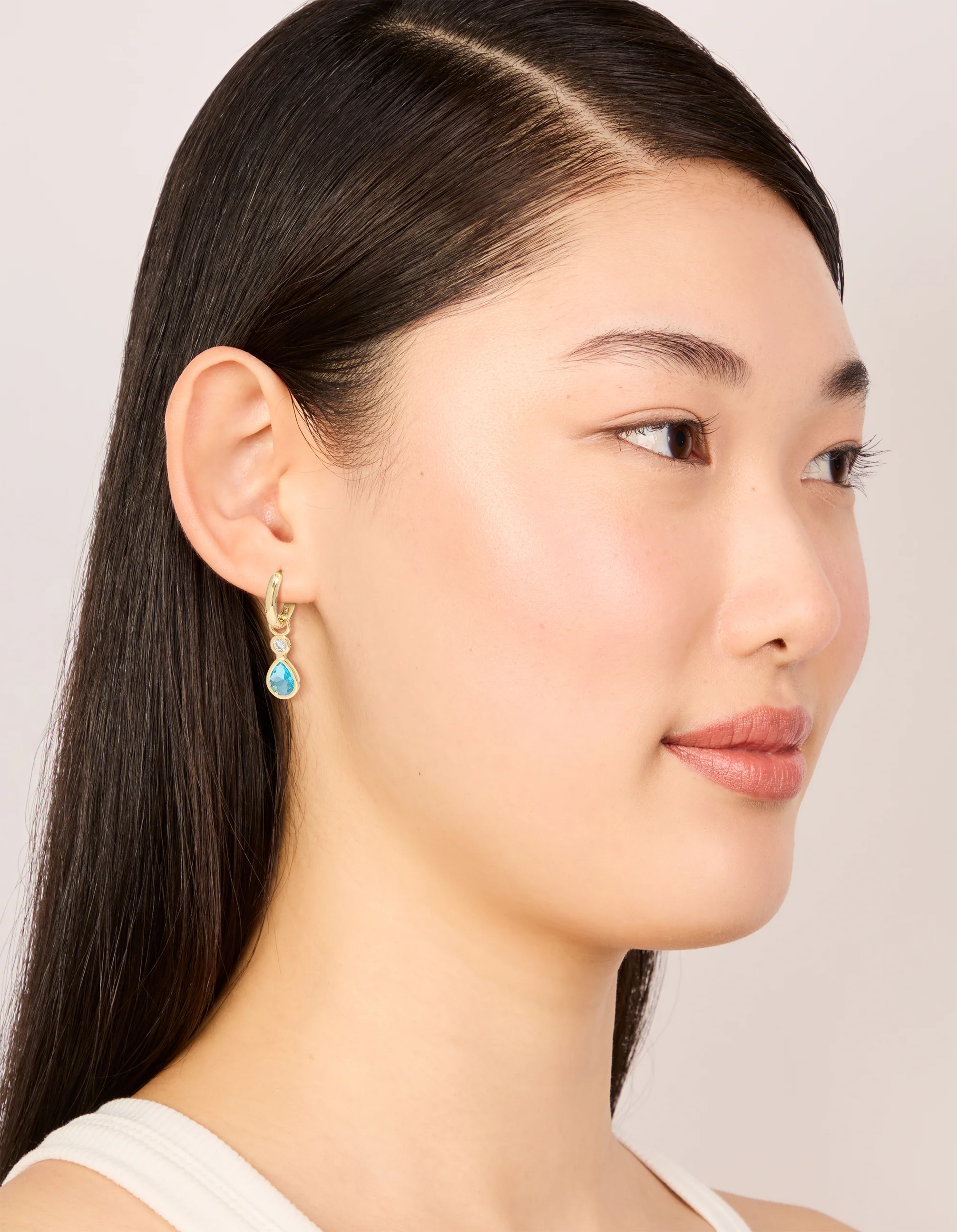 306-gold-plated-blue-cubic-zirconia-teardrop-huggie-earrings-3.webp Gold Plated Blue Cubic Zirconia Teardrop Huggie Earrings