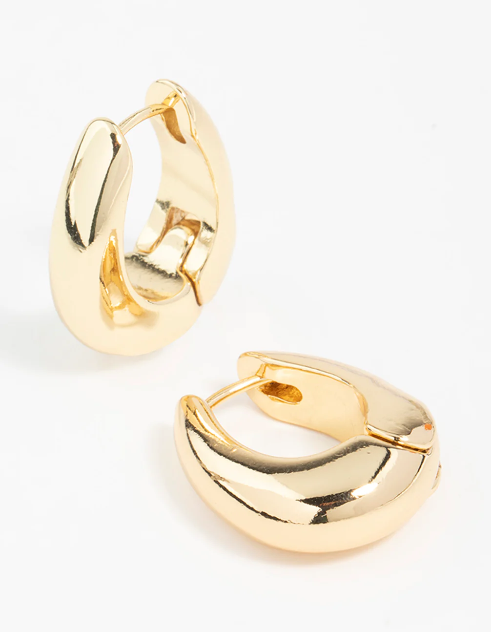 319-gold-plated-chunky-oval-huggie-hoop-earrings-1.webp Gold Plated Chunky Oval Huggie Hoop Earrings