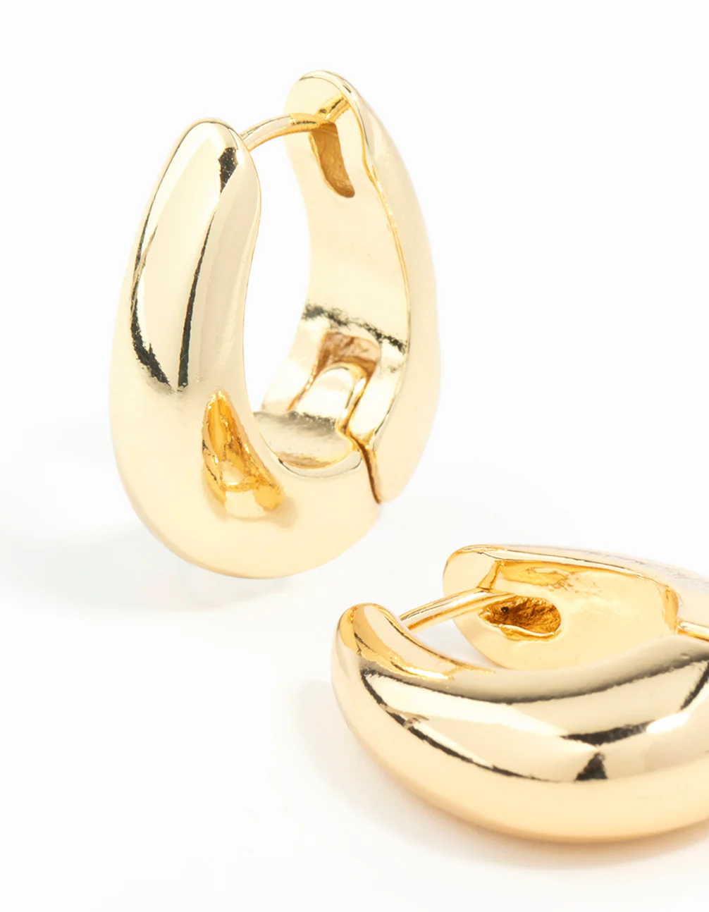 319-gold-plated-chunky-oval-huggie-hoop-earrings-3.webp Gold Plated Chunky Oval Huggie Hoop Earrings
