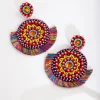 3203-fabric-bright-disc-tassel-earrings-1.webp Fabric Bright Disc Tassel Earrings