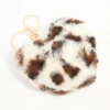 3299-fluffy-fabric-leopard-print-heart-keychain-1.webp Fluffy Fabric Leopard Print Heart Keychain
