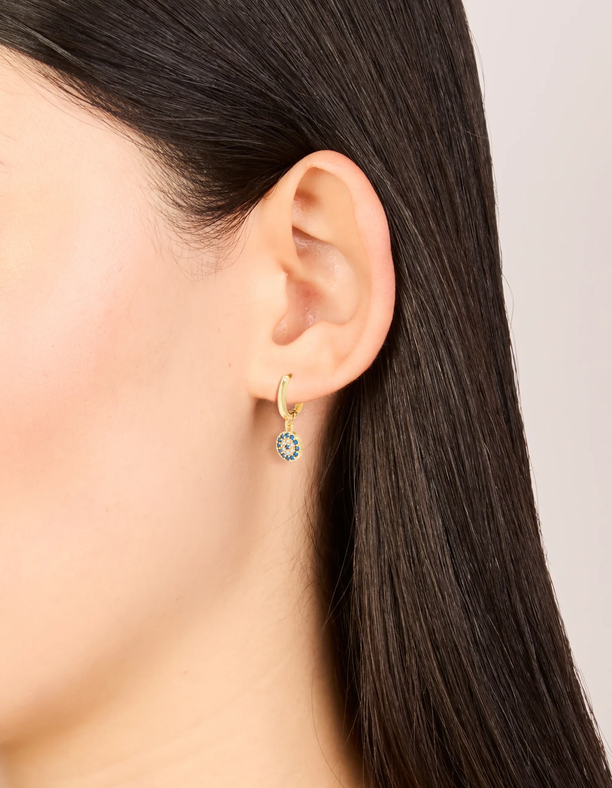 345-gold-plated-cubic-zirconia-evil-eye-circle-huggie-earrings-1.webp Gold Plated Cubic Zirconia Evil Eye Circle Huggie Earrings