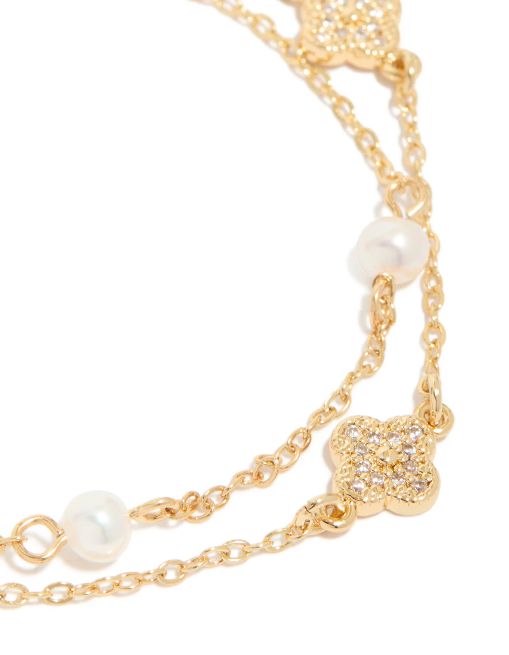 349-gold-plated-cubic-zirconia-flower-freshwater-pearl-layered-bracelet-4.webp Gold Plated Cubic Zirconia Flower & Freshwater Pearl Layered Bracelet