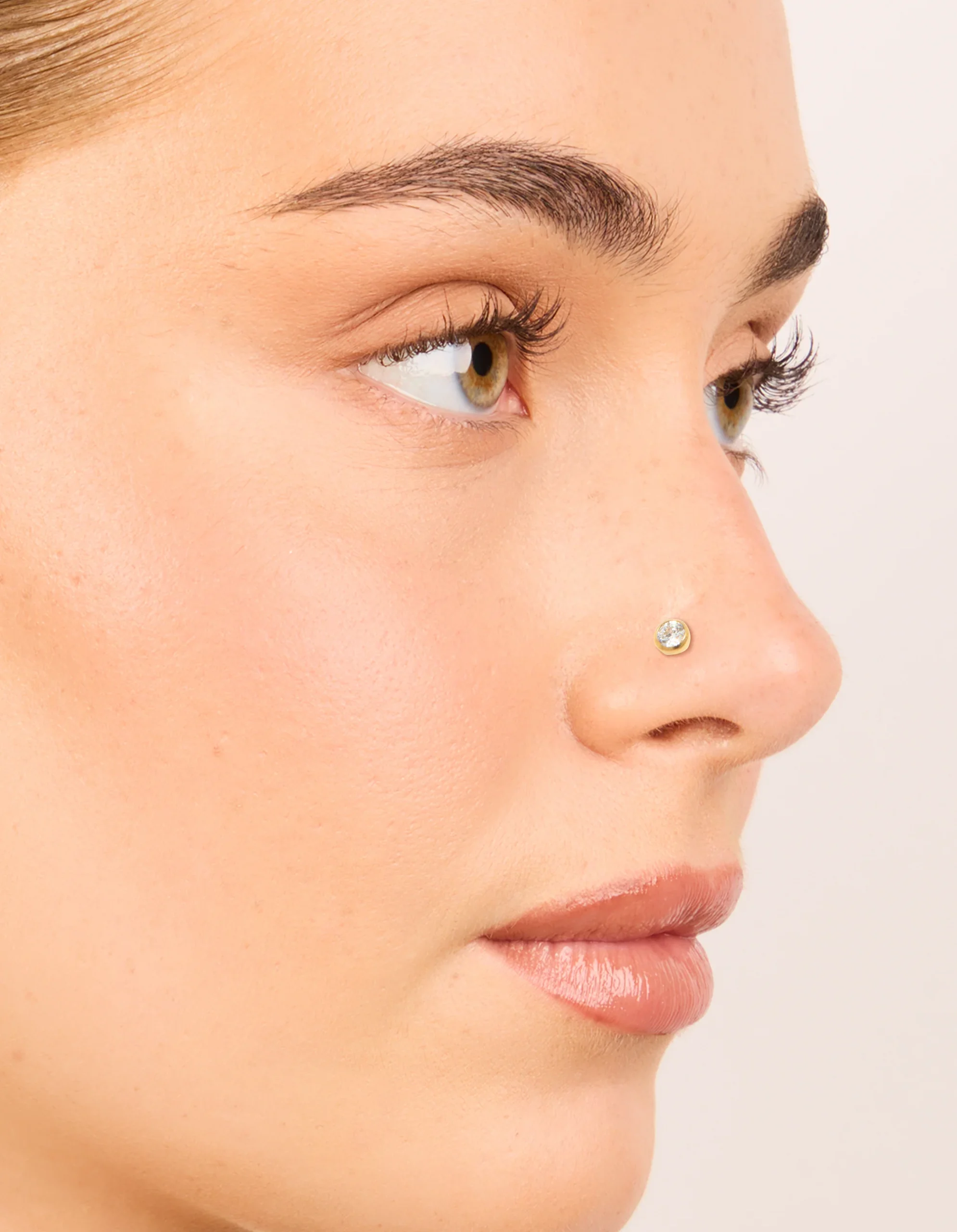 480-gold-plated-titanium-bezel-threadless-flat-back-nose-studs-1.webp Gold Plated Titanium Bezel Threadless Flat Back Nose Studs