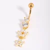 486-gold-plated-titanium-flower-belly-bar-1.webp Gold Plated Titanium Flower Belly Bar
