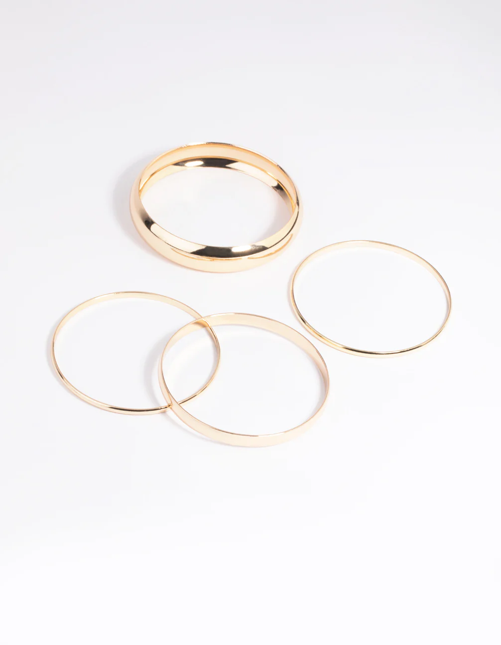515-gold-thick-thin-bangle-bracelet-4-pack-4.webp Gold Thick & Thin Bangle Bracelet 4-Pack