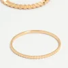 516-gold-thin-wrap-circle-stacking-rings-8-pack-2.webp Gold Thin Wrap Circle Stacking Rings 8-Pack