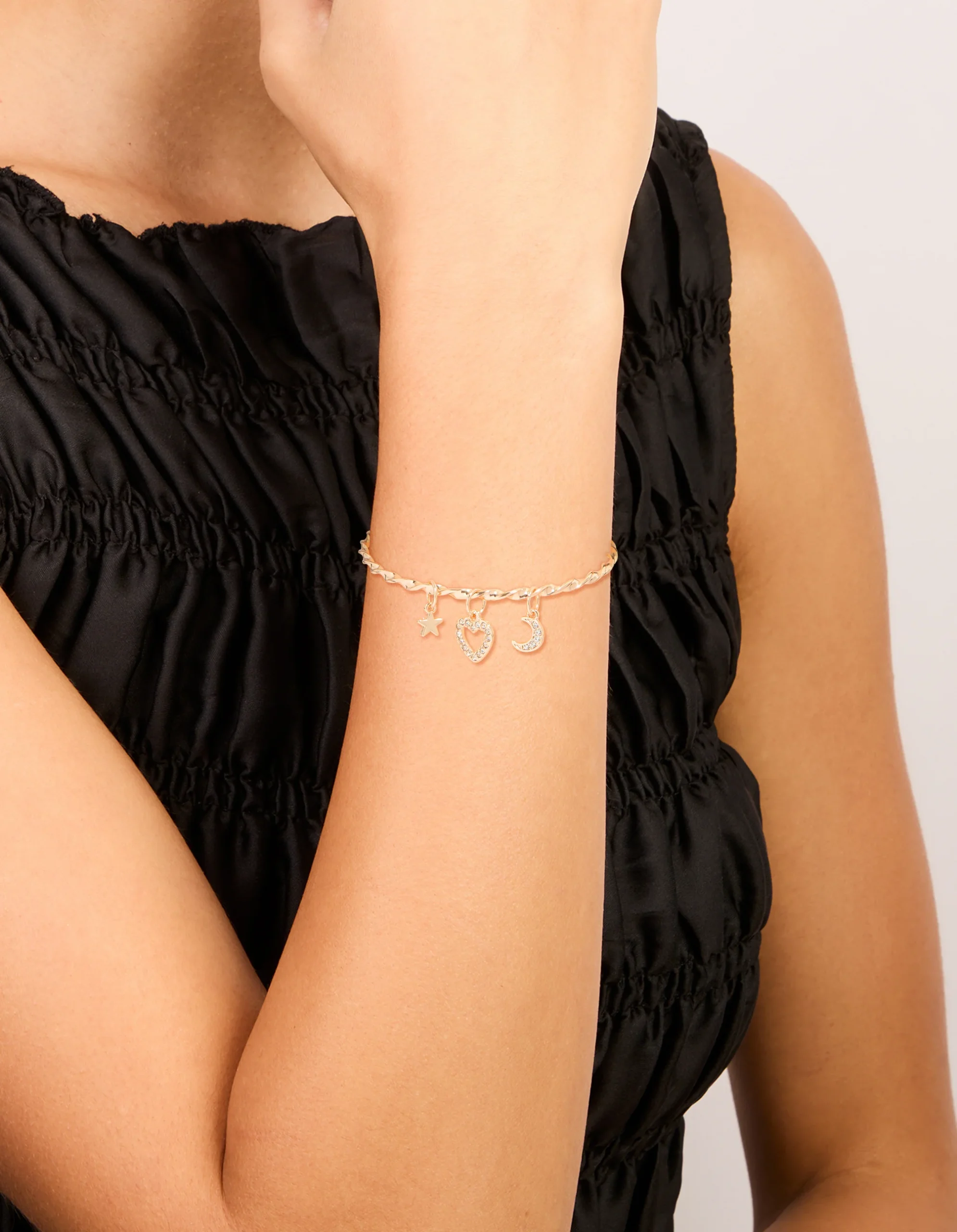 519-gold-twisted-chain-celestial-charm-toggle-bracelet-1.webp Gold Twisted Chain Celestial Charm Toggle Bracelet