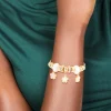 527-gold-white-flower-charm-trio-toggle-bracelet-1.webp Gold White Flower Charm Trio Toggle Bracelet