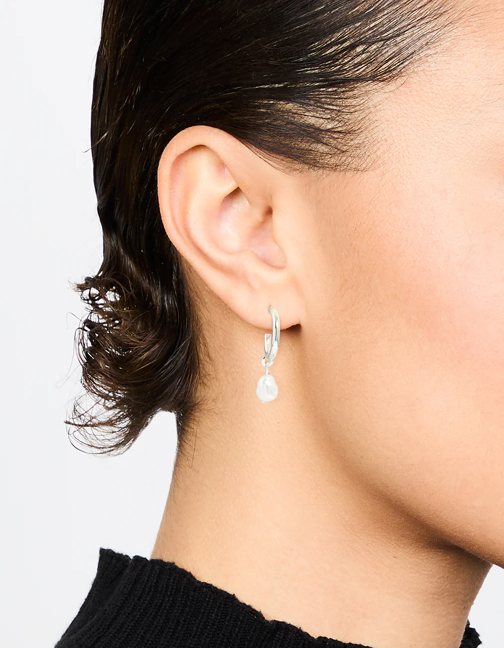 53-silver-pearl-drop-huggie-earrings-1.webp Silver Pearl Drop Huggie Earrings