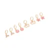 Kids Gold Unicorn & Rainbow Huggie Earrings 4-Pack