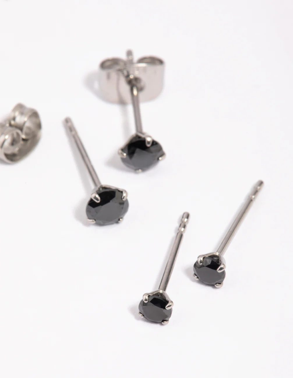 57-surgical-steel-graduating-black-cubic-zirconia-stud-earrings-2-pack-2.webp Surgical Steel Graduating Black Cubic Zirconia Stud Earrings 2-Pack