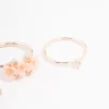 588-rose-gold-plated-triple-flower-stacking-ring-pack-3.webp Rose Gold Plated Triple Flower Stacking Ring Pack
