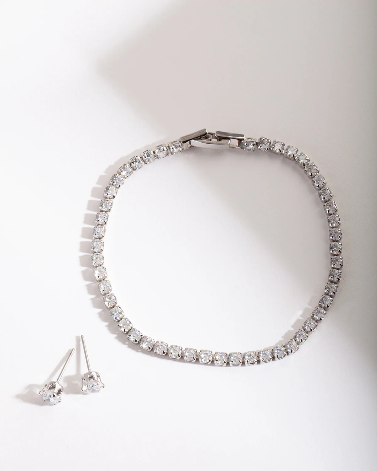 633-silver-diamond-simulant-earring-bracelet-set-1.webp Silver Diamond Simulant Earring & Bracelet Set