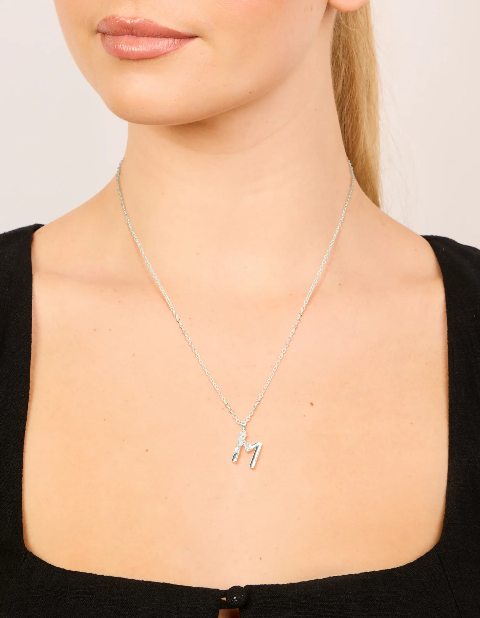 665-silver-plated-thin-cubic-zirconia-letter-m-necklace-1.webp Silver Plated Thin Cubic Zirconia Letter M Necklace